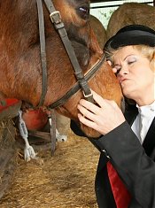 Mature slut playing with herself in a barn
